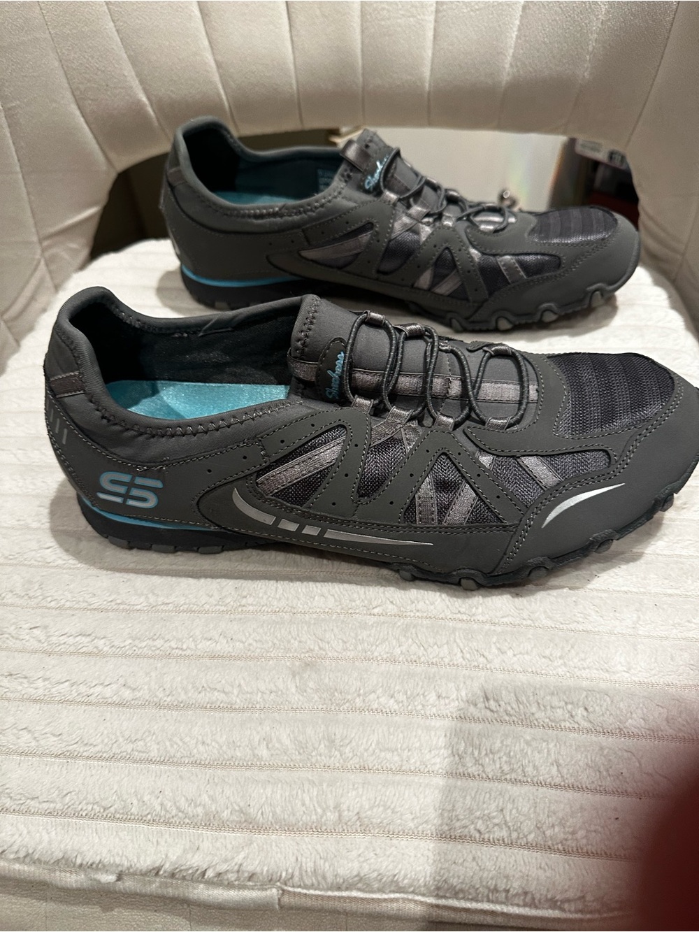Skechers Women's Black Athletic Slip-On Walking Shoes with Blue Accents